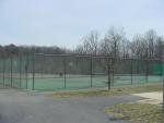 Community tennis courts are located right next to the playground and near the entrance to Regalwood Terrace.