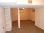 This is the rec room in the basement.  It was  recently repainted and had new carpeting installed.