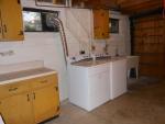 This shows some of the cabinet and counter top space available in the laundry room.