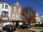 Three bedroom, 3.5 bath stone front townhouse with a one-car garage in Anne Arundel County, Laurel, MD